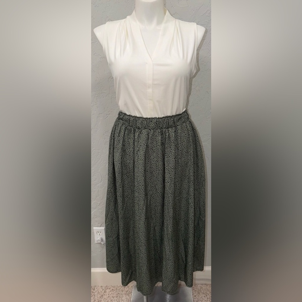 green and black polka dot midi skirt
